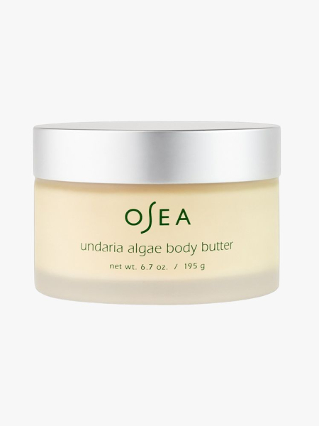 Undaria Algae Body Butter yellow tub with grey top on light grey background